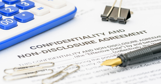 A close-up view of a confidentiality and non-disclosure agreement
