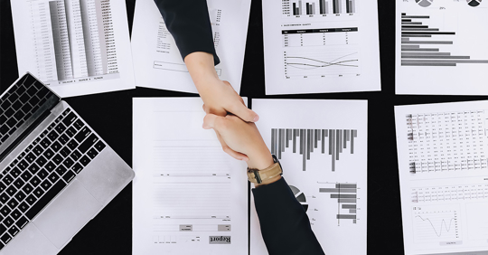 Two people shaking hands