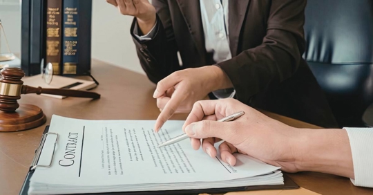 Professional reviewing legal contract