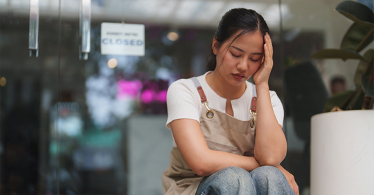 Business owner feeling the pressure of closing his business